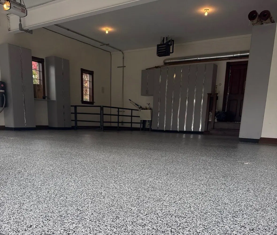 Completed chip system garage floor by Yukon Concrete Coatings